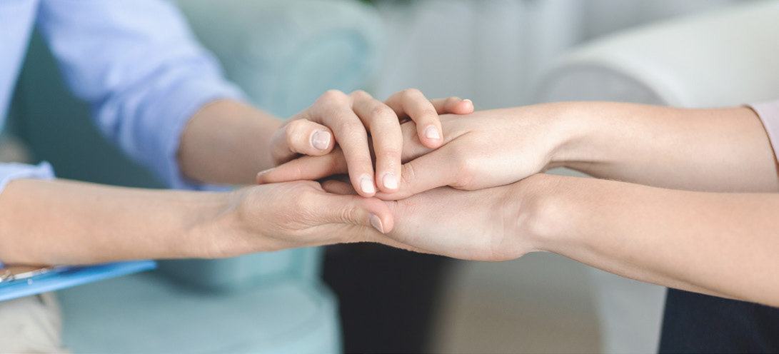 Hands embraced
