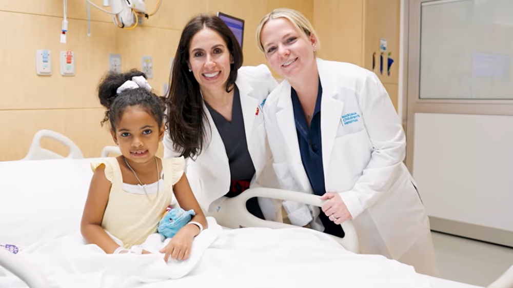 mother hugging her active son.