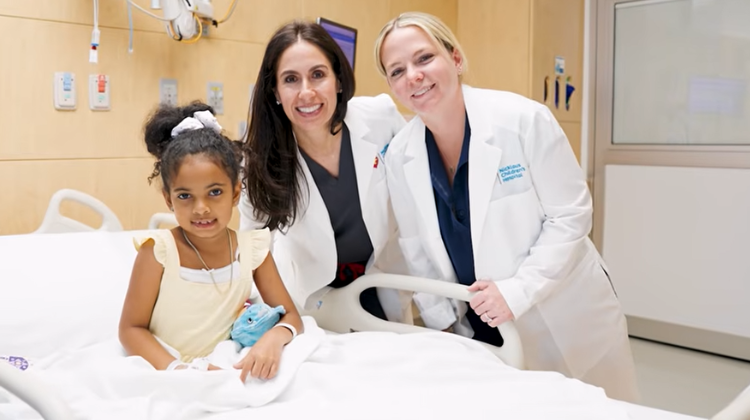 mother hugging her active son.