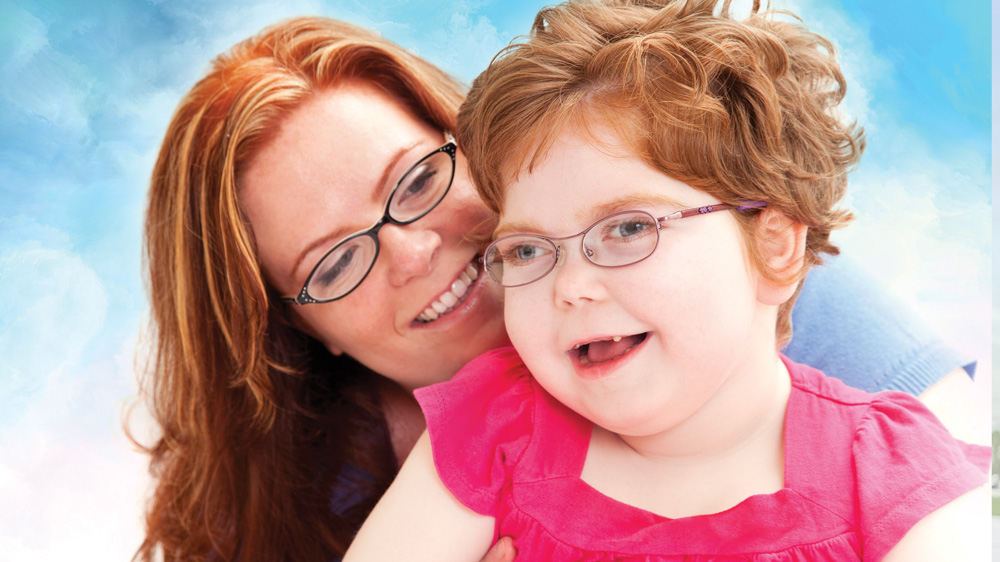 mother hugging her daughter.