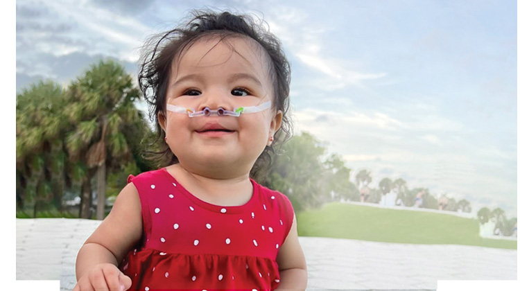 patient Keily smiling happily.